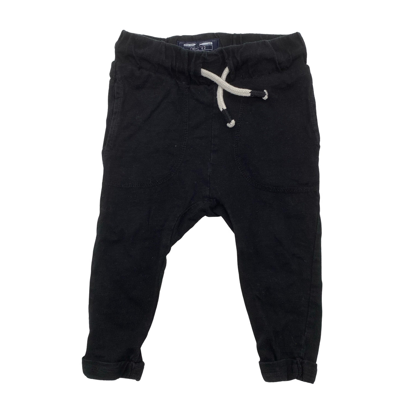 Unisex Next - Trikoohousut, koko 74 - 80 - Musta (1)