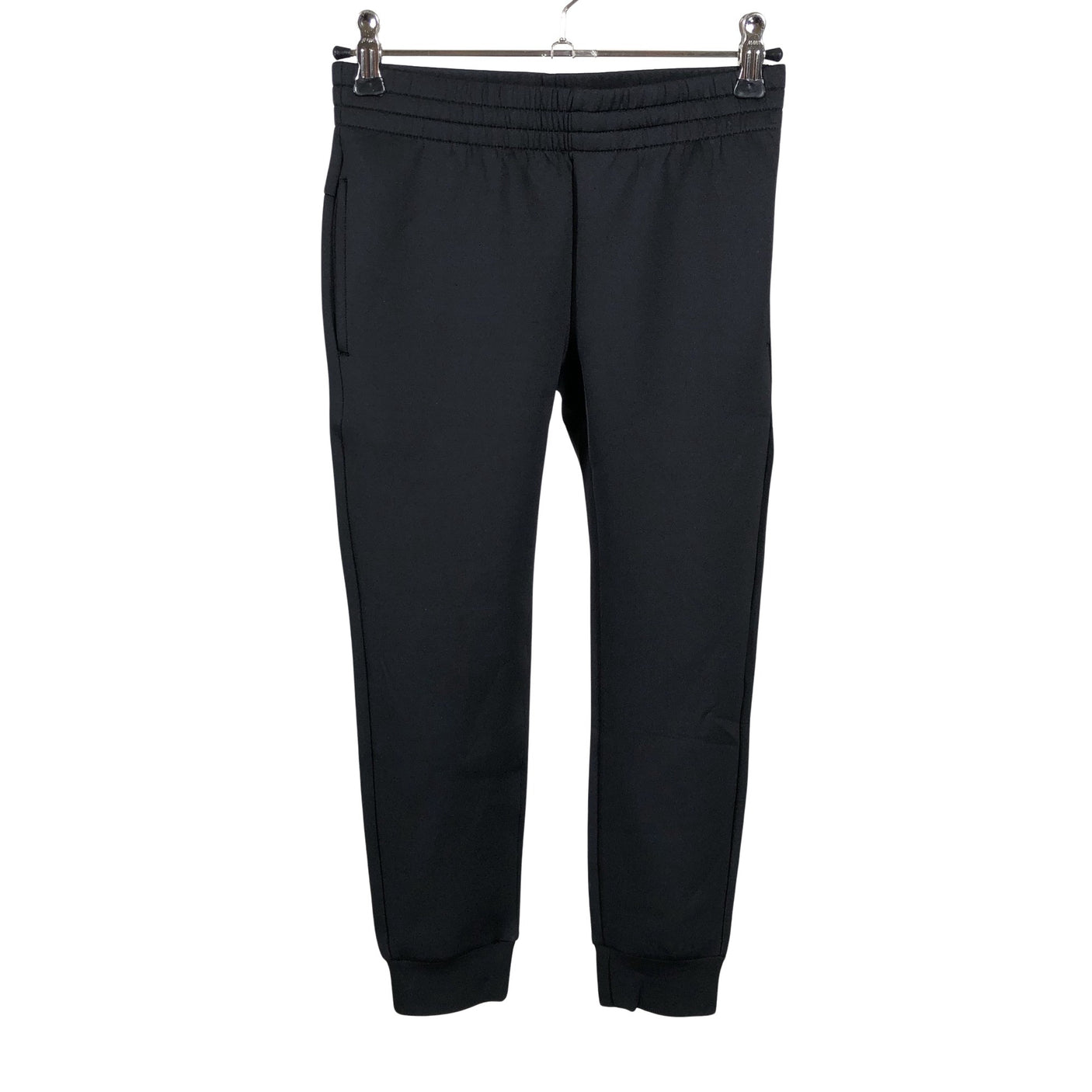 Unisex Reima - Trikoohousut, koko 116 - 122 - Musta (1)
