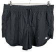 Miesten New Balance - Urheilushortsit, koko XL - Musta ()