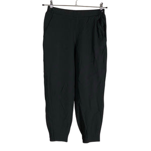 Unisex COS - Õhukesed püksid, suurus 34 - Must