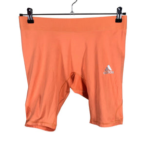 Naisten Adidas - Urheilushortsit, koko 42 - Oranssi (1)