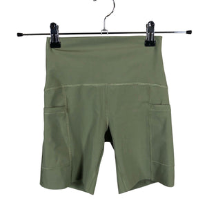 Naisten New Balance - Urheilushortsit, koko 34 - Vihreä (1)