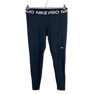 Naisten Nike - Urheilutrikoot, koko 42 - Musta (1)