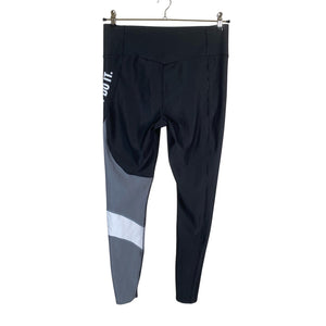 Naisten Nike - Urheilutrikoot, koko 42 - Musta (2)