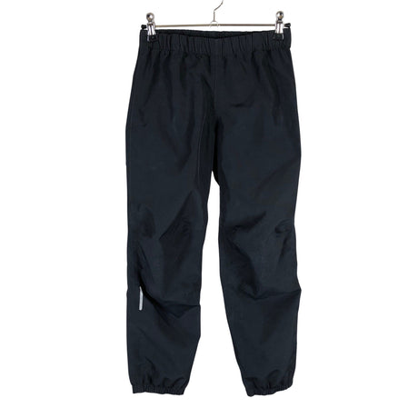 Unisex Reimatec - Välikausihousut, koko 134 - 140 - Musta ()