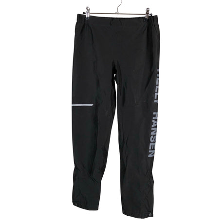 Unisex Helly Hansen - Välikausihousut, koko 146 - 152 - Musta ()