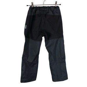 Unisex Reimatec - Välikausihousut, koko 122 - 128 - Musta (2)