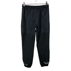 Unisex Tretorn - Välikausihousut, koko 134 - 140 - Musta (2)