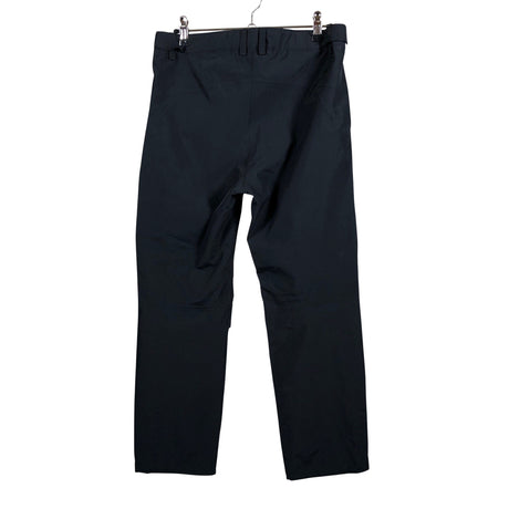 Unisex Reima - Välikausihousut, koko 134 - 140 - Musta (2)