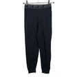 Unisex Gutz - Kerrastohousut, koko 122 - 128 - Musta ()