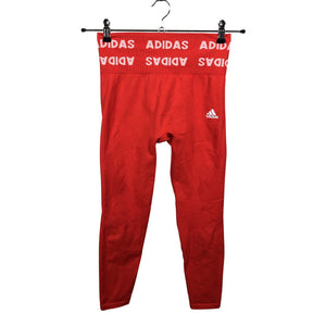Naisten Adidas - Urheilutrikoot, koko 34 - Punainen (1)