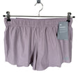 Naisten New Balance - Urheilushortsit, koko 38 - Violetti ()