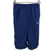 Unisex Puma - Shortsit, koko 134 - 140 - Sininen ()