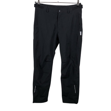 Unisex Reimatec - Välikausihousut, koko 152 - 158 - Musta ()