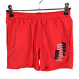 Unisex Puma - Urheilushortsit, koko 140 - 146 - Punainen ()