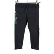 Unisex Gugguu - Collegehousut, koko 104 - 110 - Musta ()