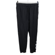 Miesten Adidas - Collegehousut, koko L - Musta ()
