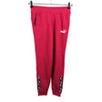 Unisex Puma - Collegehousut, koko 158 - 164 - Pinkki ()