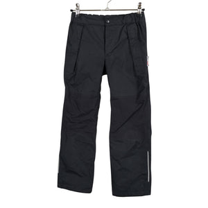 Unisex Reima - Välikausihousut, koko 128 - 134 - Musta (1)