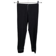 Unisex Jonathan - Kerrastohousut, koko 134 - 140 - Musta ()