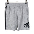 Unisex Adidas - Collegeshortsit, koko 146 - 152 - Harmaa ()