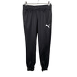 Unisex Puma - Verryttelyhousut, koko 146 - 152 - Musta ()