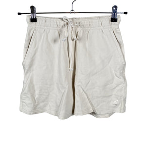 Naisten New Balance - Collegeshortsit, koko 34 - Luonnonvalkoinen (1)