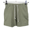 Naisten New Balance - Collegeshortsit, koko 34 - Vihreä ()