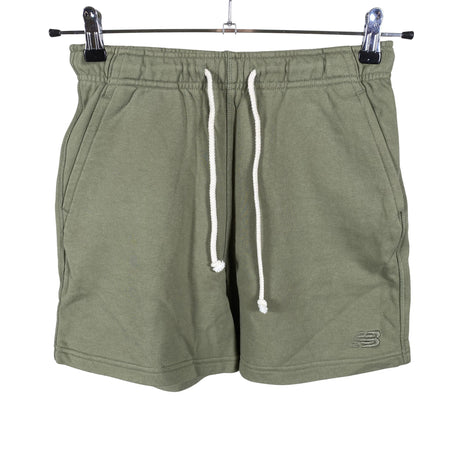 Naisten New Balance - Collegeshortsit, koko 34 - Vihreä ()