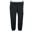 Unisex Reima - Trikoohousut, koko 116 - 122 - Musta ()