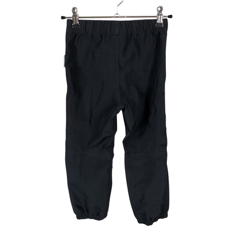 Unisex Reima - Välikausihousut, koko 110 - 116 - Musta (2)