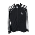 Unisex Adidas - Verryttelytakki, koko 134 - 140 - Musta ()