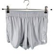 Naisten Under Armour - Urheilushortsit, koko 36 - Harmaa ()