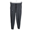 Naisten Under Armour - Urheiluhousut, koko 34 - Harmaa ()