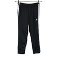 Unisex Adidas - Verryttelyhousut, koko 146 - 152 - Musta ()