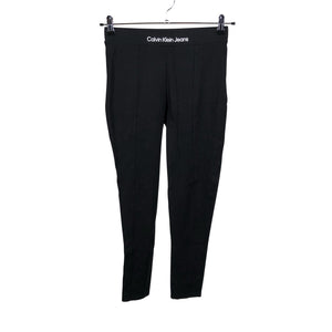 Naisten Calvin Klein Jeans - Leggingsit, koko 38 - Musta (1)