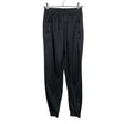 Unisex Umbro - Verryttelyhousut, koko 146 - 152 - Musta ()