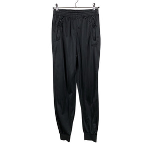 Unisex Umbro - Verryttelyhousut, koko 146 - 152 - Musta (1)