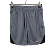 Unisex Nike - Urheilushortsit, koko 134 - 140 - Harmaa ()