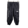 Unisex Umbro - Urheiluhousut, koko 146 - 152 - Musta ()