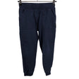 Unisex Reima - Collegehousut, koko 122 - 128 - Sininen ()