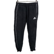 Unisex Adidas - Collegehousut, koko 134 - 140 - Musta ()