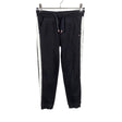 Unisex Tommy Hilfiger - Collegehousut, koko 122 - 128 - Musta ()