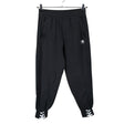 Naisten Adidas - Collegehousut, koko 38 - Musta ()
