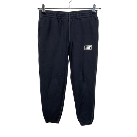 Unisex New Balance - Collegehousut, koko 152 - 158 - Musta ()