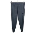 Miesten Nike - Verryttelyhousut, koko M - Harmaa ()