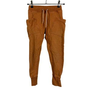 Unisex Gugguu - Collegehousut, koko 122 - 128 - Oranssi (1)