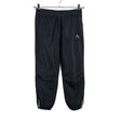 Unisex Mc Kinley - Välikausihousut, koko 158 - 164 - Musta ()