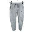 Unisex Nike - Collegehousut, koko 152 - 158 - Harmaa ()